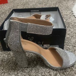 Studded heels. Worn once !